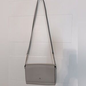 Kate Spade crossbody bag with chain straps and inside zipper pocket